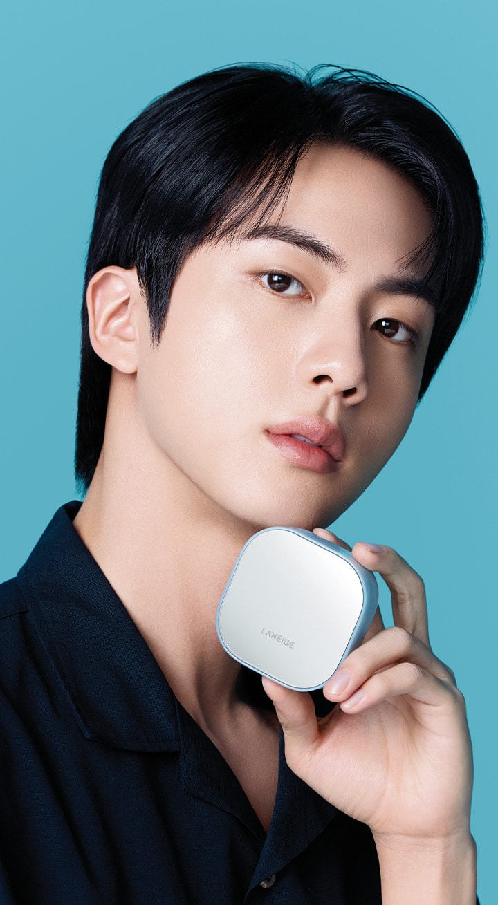 BTS Jin holding NEO Cushion Mewy